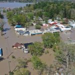 Two Michigan dams breached causing extensive flooding and massive evacuations