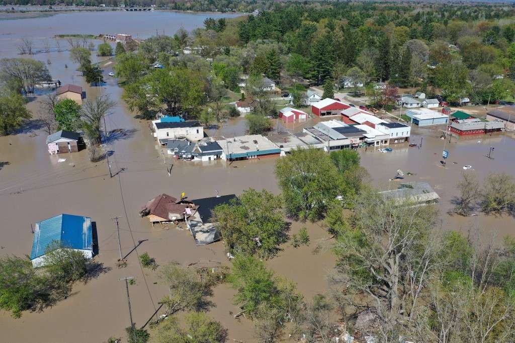 Two Michigan dams breached causing extensive flooding and massive evacuations