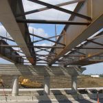 Fluid Viscous Dampers and Shock Transmitters in Realization of Multi-Span Steel-Concrete Viaducts.