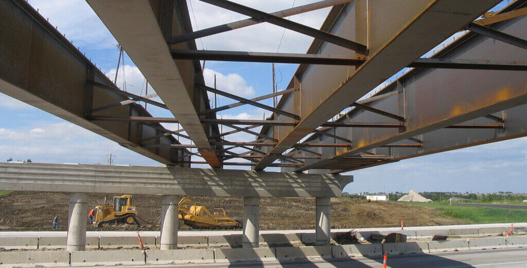 Fluid Viscous Dampers and Shock Transmitters in Realization of Multi-Span Steel-Concrete Viaducts.