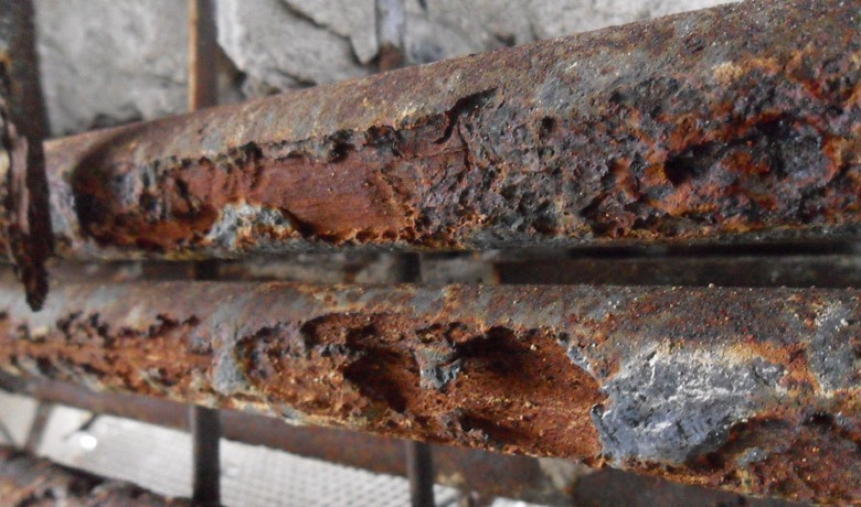 What is the effect of rusting on steel reinforcement?