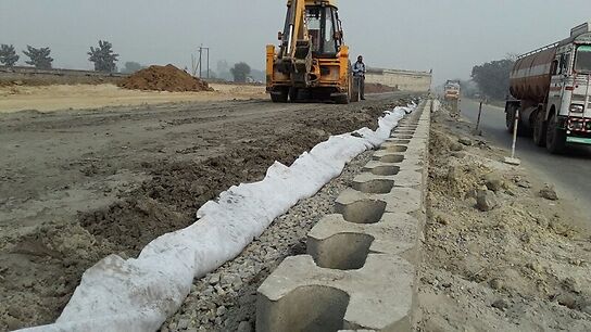 Benefits of geosynthetics in road construction?